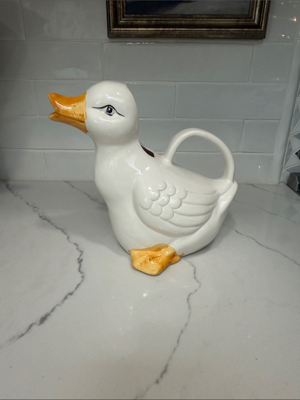 White Ceramic Duck Pitcher with Yellow Beak and Feet